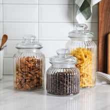 Load image into Gallery viewer, Old-Fashioned Airtight Clear Glass Storage Canisters, Set of 3 (D: 4.4&quot; x H.: 5.7&quot; / 7.3&quot; / 9.3&quot;)
