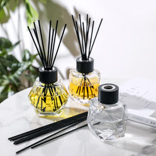 Load image into Gallery viewer, 4” Tall Glass Bottle Diffusers For Essential Oils, Set of 3 with 24 pcs Black Reed Diffuser Sticks and Black Wooden Caps (7 oz)
