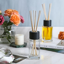 Load image into Gallery viewer, 4.7” Tall Clear Square Glass Bottle Diffusers For Essential Oils with 24 pcs Black Reed Diffuser Sticks and  Black Wooden Caps, Set of 4 ( 3.4 oz ).
